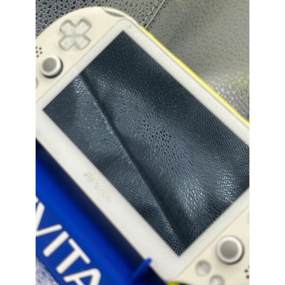 white/yellow with a dash of light blue ps vita 2000 w/charger - Picture 2 of 8